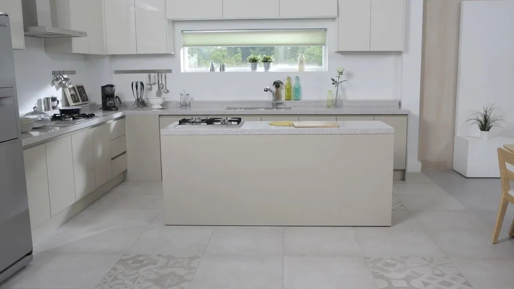 A bright kitchen with a light porcelain tile floor